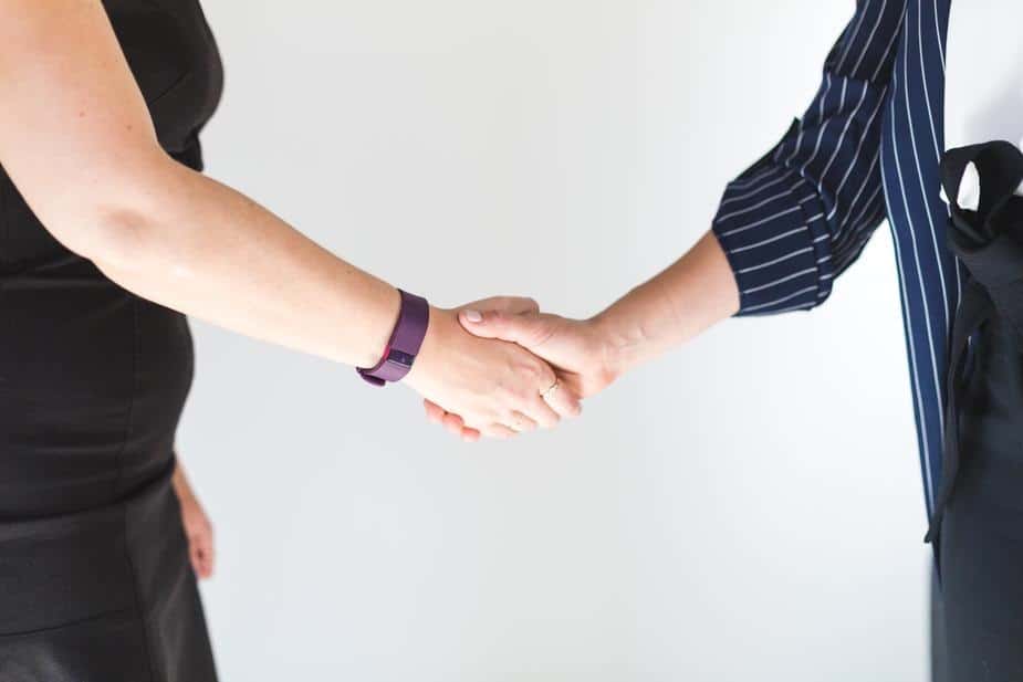 Business Women Shaking Hands, Proper Solutions Staffing Agency